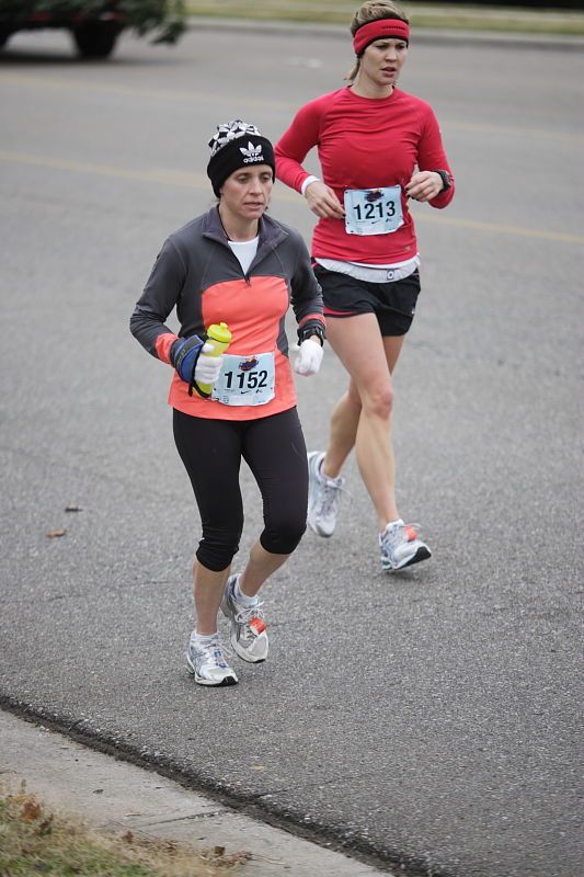 Beth Marek running the Rocket City Marathon on Saturday, December 12, 2009 in Huntsville.

Filename: SRM_20091212_12022534.JPG
Aperture: f/2.8
Shutter Speed: 1/800
Body: Canon EOS-1D Mark II
Lens: Canon EF 80-200mm f/2.8 L