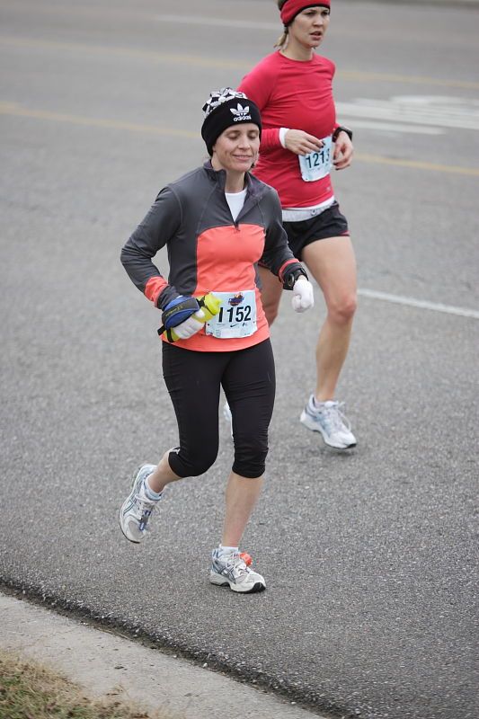 Beth Marek running the Rocket City Marathon on Saturday, December 12, 2009 in Huntsville.

Filename: SRM_20091212_12022639.JPG
Aperture: f/2.8
Shutter Speed: 1/800
Body: Canon EOS-1D Mark II
Lens: Canon EF 80-200mm f/2.8 L