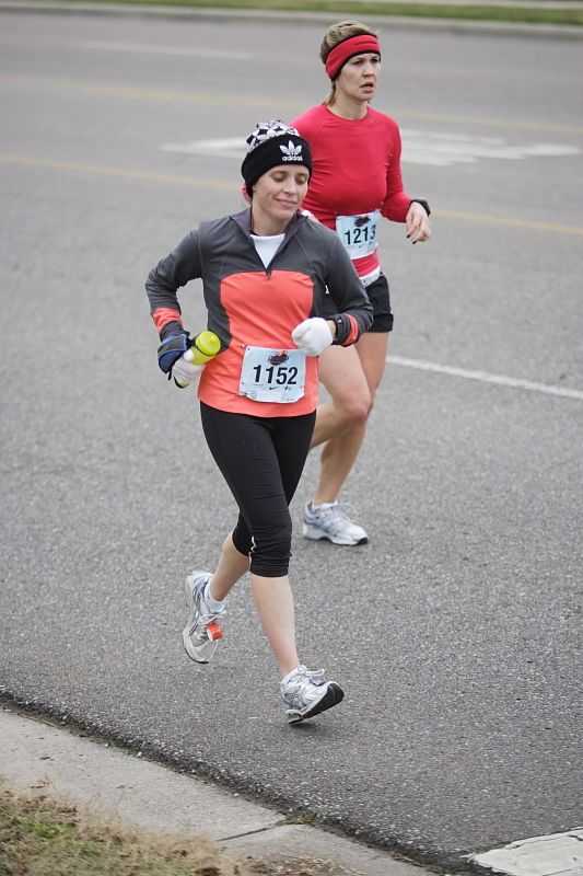 Beth Marek running the Rocket City Marathon on Saturday, December 12, 2009 in Huntsville.

Filename: SRM_20091212_12022641.JPG
Aperture: f/2.8
Shutter Speed: 1/800
Body: Canon EOS-1D Mark II
Lens: Canon EF 80-200mm f/2.8 L