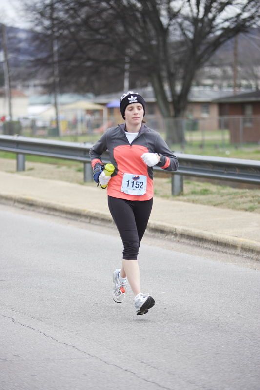 Beth Marek running the Rocket City Marathon on Saturday, December 12, 2009 in Huntsville.

Filename: SRM_20091212_12531953.JPG
Aperture: f/2.8
Shutter Speed: 1/800
Body: Canon EOS-1D Mark II
Lens: Canon EF 80-200mm f/2.8 L