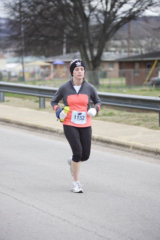 Beth Marek running the Rocket City Marathon on Saturday, December 12, 2009 in Huntsville.

Filename: SRM_20091212_12531954.JPG
Aperture: f/2.8
Shutter Speed: 1/800
Body: Canon EOS-1D Mark II
Lens: Canon EF 80-200mm f/2.8 L