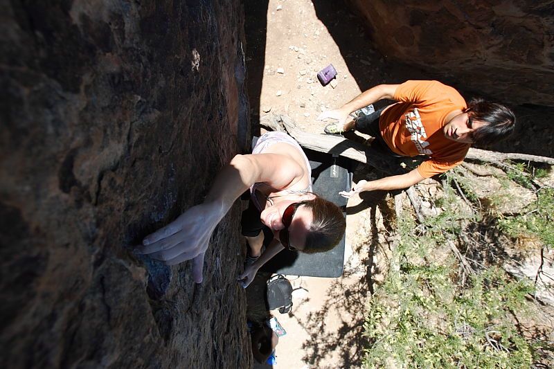 Beth Marek rock climbing in Hueco Tanks State Park and Historic Site during the Hueco Tanks Awesome Fest 2010 trip, Friday, May 21, 2010.

Filename: SRM_20100521_13241771.JPG
Aperture: f/5.6
Shutter Speed: 1/640
Body: Canon EOS-1D Mark II
Lens: Canon EF 16-35mm f/2.8 L