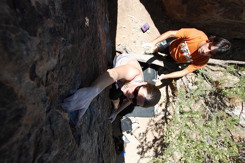 Beth Marek rock climbing in Hueco Tanks State Park and Historic Site during the Hueco Tanks Awesome Fest 2010 trip, Friday, May 21, 2010.

Filename: SRM_20100521_13241873.JPG
Aperture: f/5.6
Shutter Speed: 1/640
Body: Canon EOS-1D Mark II
Lens: Canon EF 16-35mm f/2.8 L