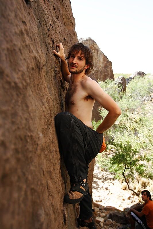 Andrew Dreher rock climbing in Hueco Tanks State Park and Historic Site during the Hueco Tanks Awesome Fest 2010 trip, Friday, May 21, 2010.

Filename: SRM_20100521_17450139.JPG
Aperture: f/3.5
Shutter Speed: 1/320
Body: Canon EOS-1D Mark II
Lens: Canon EF 16-35mm f/2.8 L