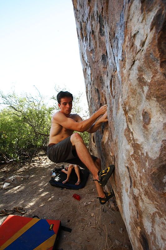 Raanan Robertson rock climbing in Hueco Tanks State Park and Historic Site during the Hueco Tanks Awesome Fest 2010 trip, Friday, May 21, 2010.

Filename: SRM_20100521_19250696.JPG
Aperture: f/8.0
Shutter Speed: 1/200
Body: Canon EOS-1D Mark II
Lens: Canon EF 16-35mm f/2.8 L