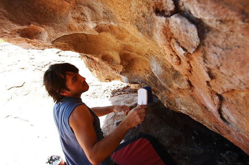 Javier Morales rock climbing in Hueco Tanks State Park and Historic Site during the Hueco Tanks Awesome Fest 2010 trip, Saturday, May 22, 2010.

Filename: SRM_20100522_12121387.JPG
Aperture: f/5.6
Shutter Speed: 1/200
Body: Canon EOS-1D Mark II
Lens: Canon EF 16-35mm f/2.8 L