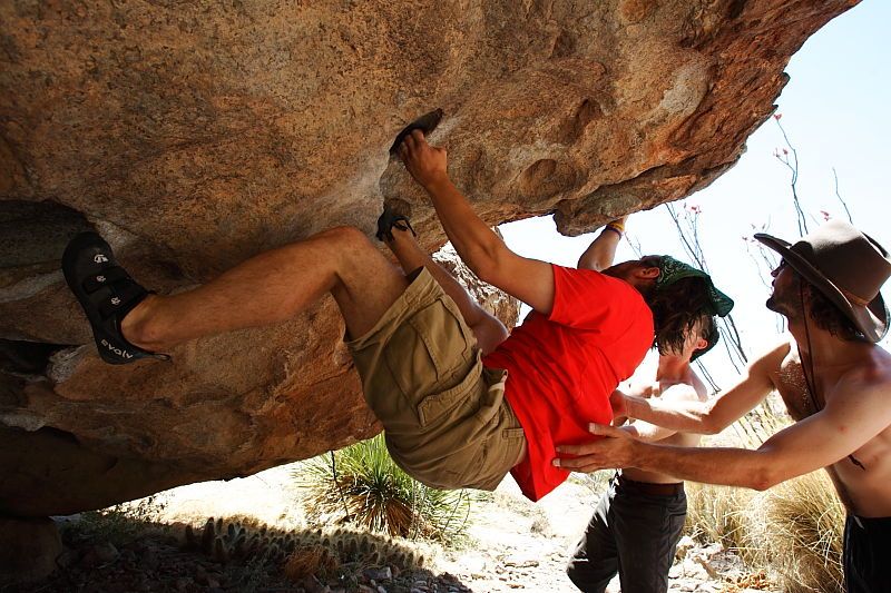 Steve Marek rock climbing on No One Gets Out of Here Alive (V2) in Hueco Tanks State Park and Historic Site during the Hueco Tanks Awesome Fest 2010 trip, Saturday, May 22, 2010.

Filename: SRM_20100522_15183311.JPG
Aperture: f/5.6
Shutter Speed: 1/640
Body: Canon EOS-1D Mark II
Lens: Canon EF 16-35mm f/2.8 L