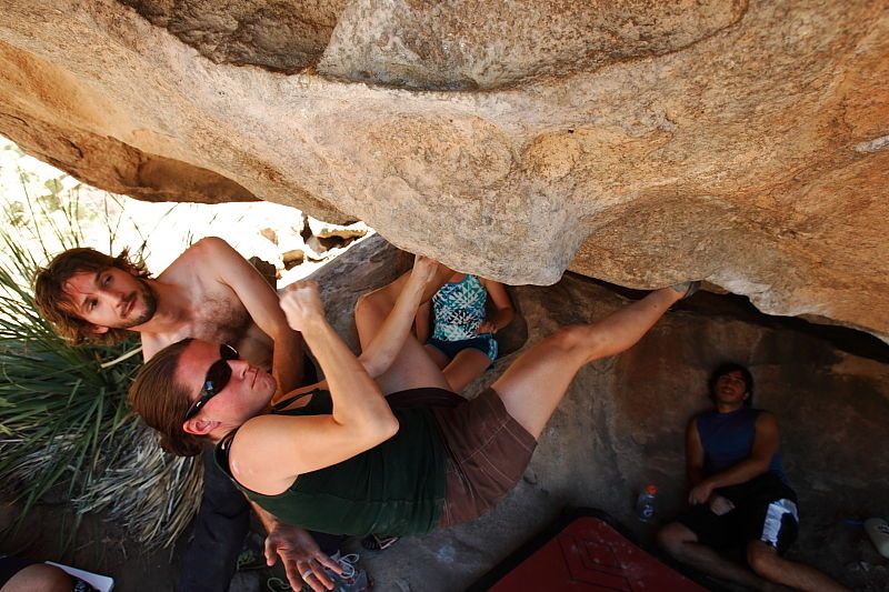 Beth Marek rock climbing on No One Gets Out of Here Alive (V2) in Hueco Tanks State Park and Historic Site during the Hueco Tanks Awesome Fest 2010 trip, Saturday, May 22, 2010.

Filename: SRM_20100522_15321593.JPG
Aperture: f/5.6
Shutter Speed: 1/320
Body: Canon EOS-1D Mark II
Lens: Canon EF 16-35mm f/2.8 L