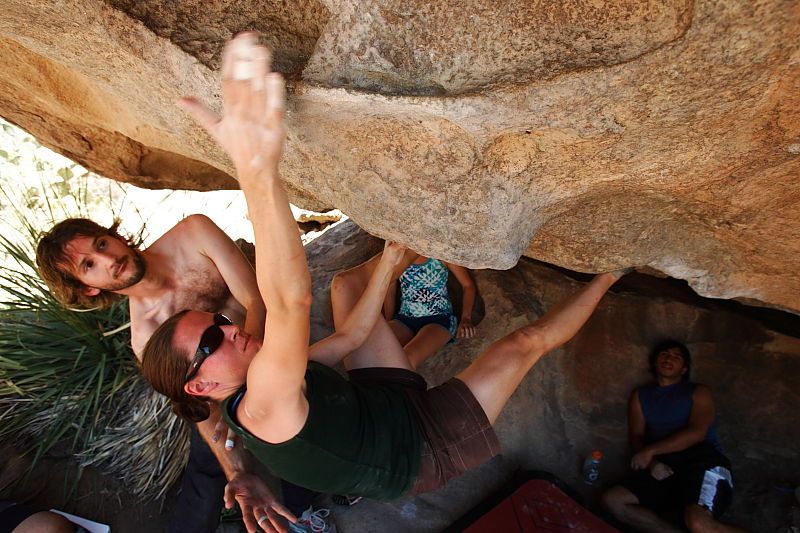 Beth Marek rock climbing on No One Gets Out of Here Alive (V2) in Hueco Tanks State Park and Historic Site during the Hueco Tanks Awesome Fest 2010 trip, Saturday, May 22, 2010.

Filename: SRM_20100522_15321594.JPG
Aperture: f/5.6
Shutter Speed: 1/400
Body: Canon EOS-1D Mark II
Lens: Canon EF 16-35mm f/2.8 L