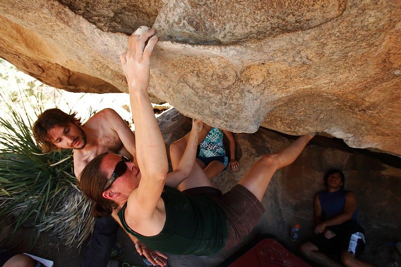 Beth Marek rock climbing on No One Gets Out of Here Alive (V2) in Hueco Tanks State Park and Historic Site during the Hueco Tanks Awesome Fest 2010 trip, Saturday, May 22, 2010.

Filename: SRM_20100522_15321698.JPG
Aperture: f/5.6
Shutter Speed: 1/400
Body: Canon EOS-1D Mark II
Lens: Canon EF 16-35mm f/2.8 L