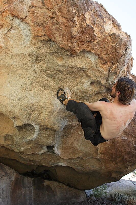 Andrew Dreher rock climbing on No One Gets Out of Here Alive (V2) in Hueco Tanks State Park and Historic Site during the Hueco Tanks Awesome Fest 2010 trip, Sunday, May 23, 2010.

Filename: SRM_20100523_10520455.JPG
Aperture: f/5.6
Shutter Speed: 1/640
Body: Canon EOS-1D Mark II
Lens: Canon EF 16-35mm f/2.8 L