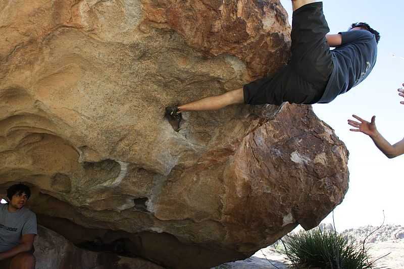 Raanan Robertson rock climbing on No One Gets Out of Here Alive (V2) in Hueco Tanks State Park and Historic Site during the Hueco Tanks Awesome Fest 2010 trip, Sunday, May 23, 2010.

Filename: SRM_20100523_10570702.JPG
Aperture: f/5.6
Shutter Speed: 1/500
Body: Canon EOS-1D Mark II
Lens: Canon EF 16-35mm f/2.8 L