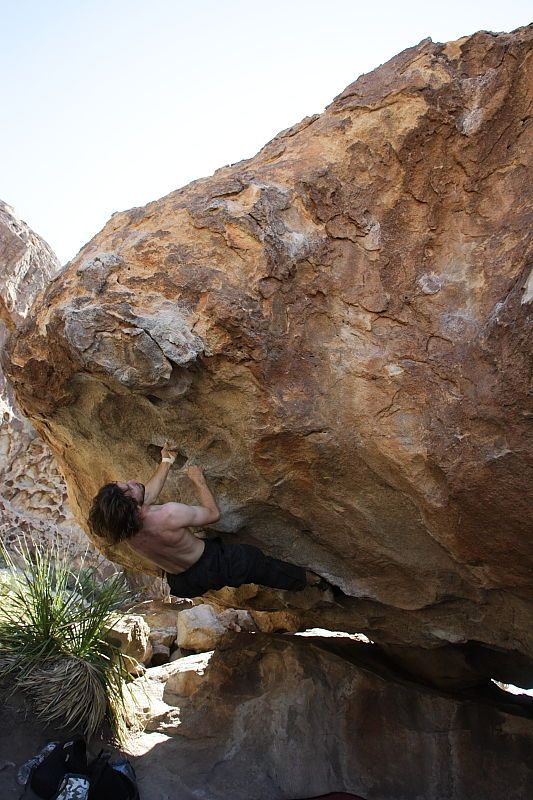 Andrew Dreher rock climbing on No One Gets Out of Here Alive (V2) in Hueco Tanks State Park and Historic Site during the Hueco Tanks Awesome Fest 2010 trip, Sunday, May 23, 2010.

Filename: SRM_20100523_11223983.JPG
Aperture: f/5.6
Shutter Speed: 1/500
Body: Canon EOS-1D Mark II
Lens: Canon EF 16-35mm f/2.8 L