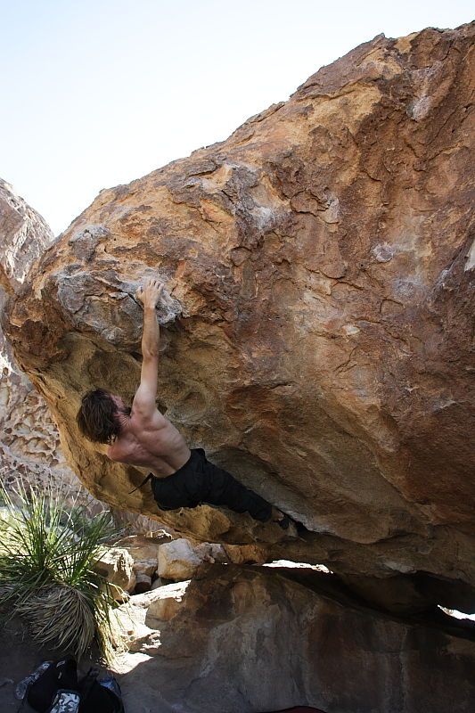 Andrew Dreher rock climbing on No One Gets Out of Here Alive (V2) in Hueco Tanks State Park and Historic Site during the Hueco Tanks Awesome Fest 2010 trip, Sunday, May 23, 2010.

Filename: SRM_20100523_11223986.JPG
Aperture: f/5.6
Shutter Speed: 1/500
Body: Canon EOS-1D Mark II
Lens: Canon EF 16-35mm f/2.8 L