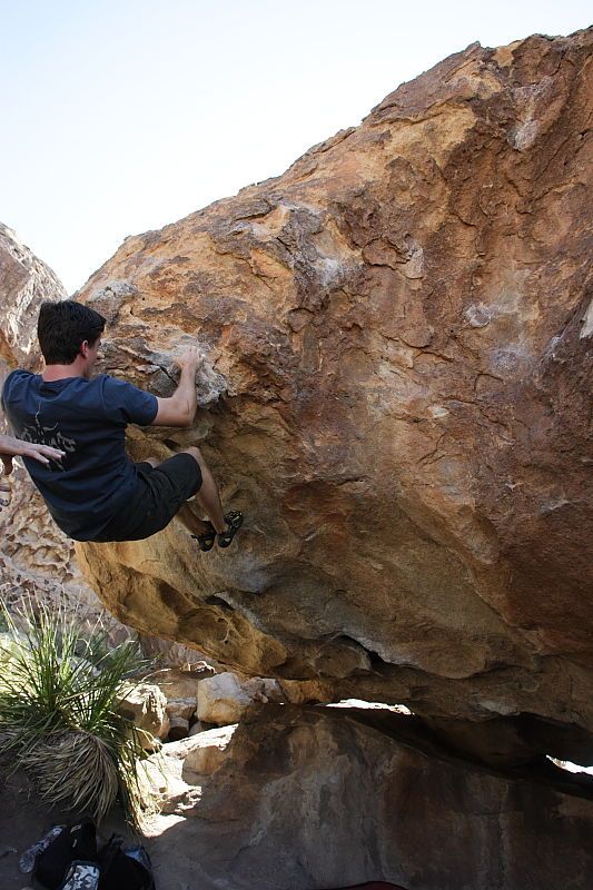 Raanan Robertson rock climbing on Pull the Pin in Hueco Tanks State Park and Historic Site during the Hueco Tanks Awesome Fest 2010 trip, Sunday, May 23, 2010.

Filename: SRM_20100523_11262123.JPG
Aperture: f/5.6
Shutter Speed: 1/500
Body: Canon EOS-1D Mark II
Lens: Canon EF 16-35mm f/2.8 L