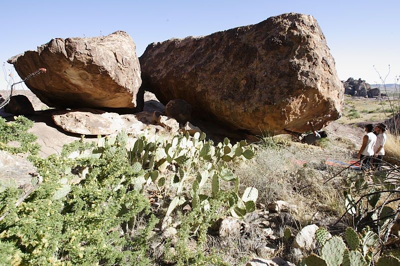 Cayce Wilson rock climbing on No One Gets Out of Here Alive (V2) in Hueco Tanks State Park and Historic Site during the Hueco Tanks Awesome Fest 2010 trip, Sunday, May 23, 2010.

Filename: SRM_20100523_18321730.JPG
Aperture: f/8.0
Shutter Speed: 1/320
Body: Canon EOS-1D Mark II
Lens: Canon EF 16-35mm f/2.8 L