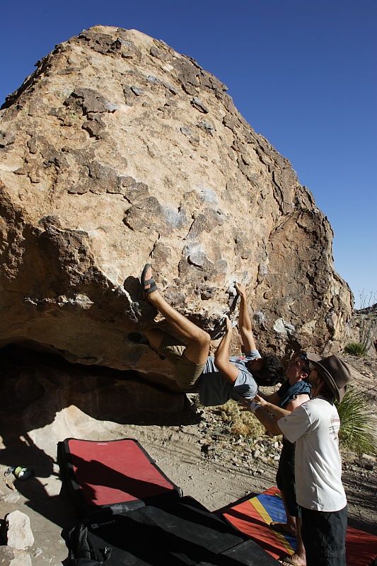 Cayce Wilson rock climbing on No One Gets Out of Here Alive (V2) in Hueco Tanks State Park and Historic Site during the Hueco Tanks Awesome Fest 2010 trip, Sunday, May 23, 2010.

Filename: SRM_20100523_18452797.JPG
Aperture: f/8.0
Shutter Speed: 1/1000
Body: Canon EOS-1D Mark II
Lens: Canon EF 16-35mm f/2.8 L