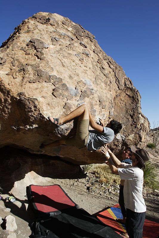 Cayce Wilson rock climbing on No One Gets Out of Here Alive (V2) in Hueco Tanks State Park and Historic Site during the Hueco Tanks Awesome Fest 2010 trip, Sunday, May 23, 2010.

Filename: SRM_20100523_18452903.JPG
Aperture: f/8.0
Shutter Speed: 1/1000
Body: Canon EOS-1D Mark II
Lens: Canon EF 16-35mm f/2.8 L