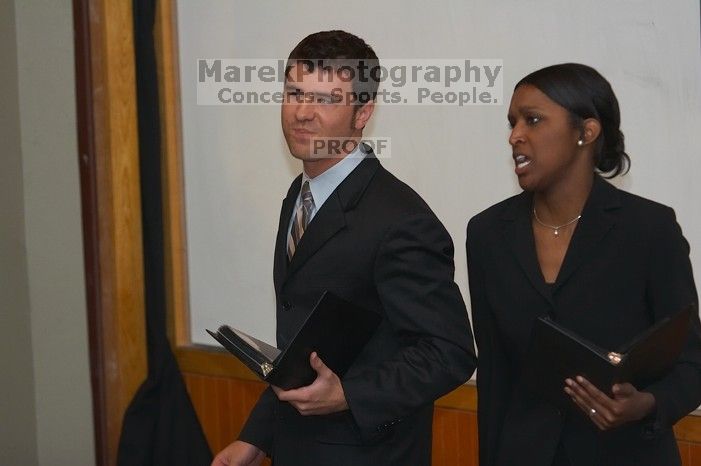 Eric Cullather and Nichole Martin practice their Duo Interpretive of "This Is How It Goes" by Neil Labute.  The University of Texas' Speech Team will compete in the American Forensic Associations National Individual Events Tournament (AFA NIET) in Gainesv

Filename: SRM_20060325_143546_2.jpg
Aperture: f/3.5
Shutter Speed: 1/160
Body: Canon EOS 20D
Lens: Canon EF 80-200mm f/2.8 L