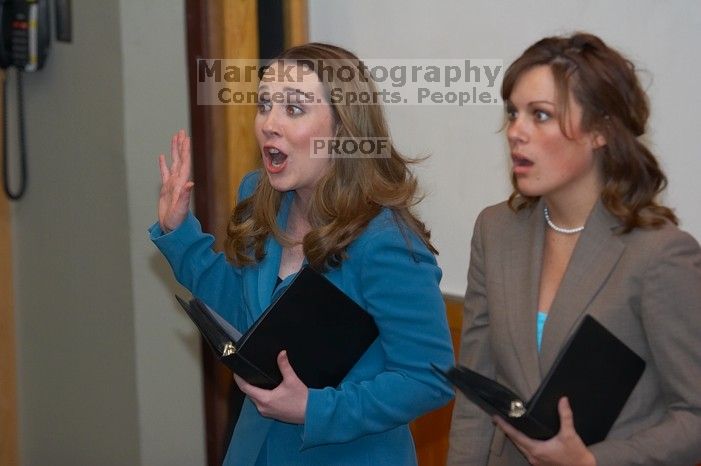 Caetlin Mangan and Mary Kate Raffetto rehearse their Duo Interpretive of Scott Orgon's "China."  The University of Texas' Speech Team will compete in the American Forensic Associations National Individual Events Tournament (AFA NIET) in Gainesville, Flori

Filename: SRM_20060325_141430_0.jpg
Aperture: f/3.5
Shutter Speed: 1/160
Body: Canon EOS 20D
Lens: Canon EF 80-200mm f/2.8 L