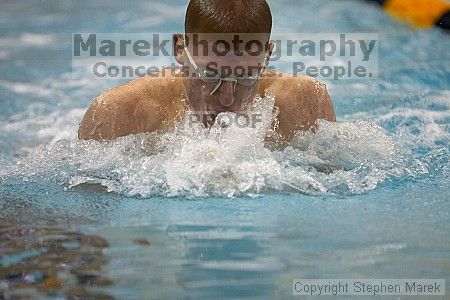 Alex Williams competed in the men's 100 yd breaststroke against UVA

Filename: crw_3801_std.jpg
Aperture: f/2.8
Shutter Speed: 1/500
Body: Canon EOS DIGITAL REBEL
Lens: Canon EF 80-200mm f/2.8 L