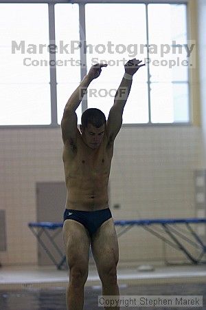 Diver Pete Doblar competes against the University of Tennessee.

Filename: crw_2181_std.jpg
Aperture: f/2.8
Shutter Speed: 1/640
Body: Canon EOS DIGITAL REBEL
Lens: Canon EF 80-200mm f/2.8 L