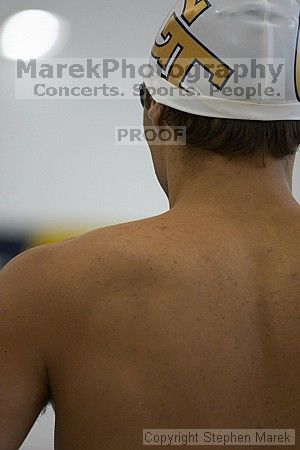 Jeremy Raines competes against the University of Tennessee in the backstroke.

Filename: crw_2216_std.jpg
Aperture: f/2.8
Shutter Speed: 1/320
Body: Canon EOS DIGITAL REBEL
Lens: Canon EF 80-200mm f/2.8 L