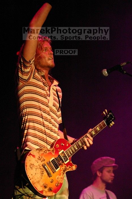 Puddle of Mudd performs on the 99X stage on the first day of Music Midtown, 2004.

Filename: IMG_6090.jpg
Aperture: f/4.0
Shutter Speed: 1/160
Body: Canon EOS DIGITAL REBEL
Lens: Canon EF 80-200mm f/2.8 L