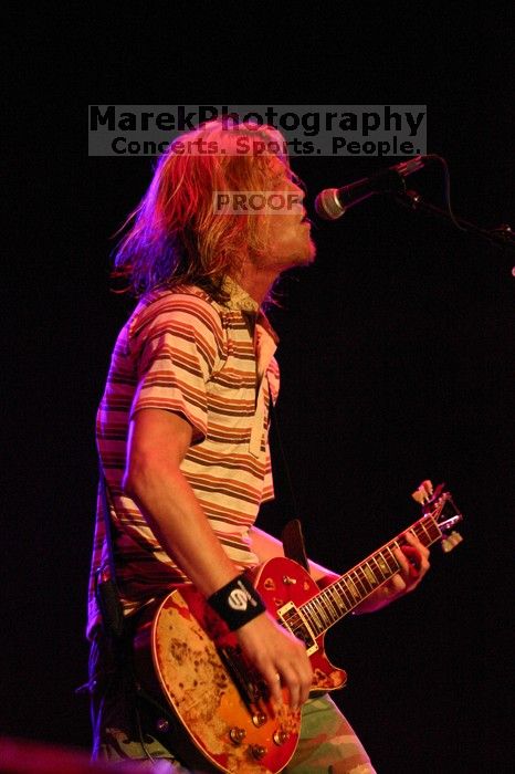 Puddle of Mudd performs on the 99X stage on the first day of Music Midtown, 2004.

Filename: IMG_6089.jpg
Aperture: f/2.8
Shutter Speed: 1/160
Body: Canon EOS DIGITAL REBEL
Lens: Canon EF 80-200mm f/2.8 L