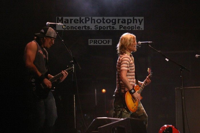 Puddle of Mudd performs on the 99X stage on the first day of Music Midtown, 2004.

Filename: IMG_6122.jpg
Aperture: f/2.8
Shutter Speed: 1/200
Body: Canon EOS DIGITAL REBEL
Lens: Canon EF 80-200mm f/2.8 L