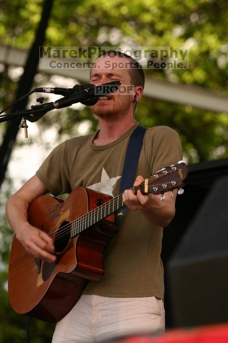 Damien Rice performs on the 99X stage on the second day of Music Midtown, 2004.

Filename: IMG_6374.jpg
Aperture: f/5.0
Shutter Speed: 1/320
Body: Canon EOS DIGITAL REBEL
Lens: Canon EF 80-200mm f/2.8 L