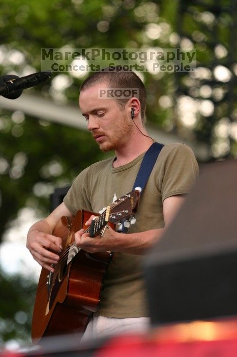 Damien Rice performs on the 99X stage on the second day of Music Midtown, 2004.

Filename: IMG_6323.jpg
Aperture: f/3.5
Shutter Speed: 1/320
Body: Canon EOS DIGITAL REBEL
Lens: Canon EF 80-200mm f/2.8 L