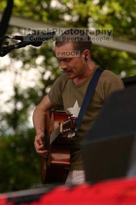 Damien Rice performs on the 99X stage on the second day of Music Midtown, 2004.

Filename: IMG_6378.jpg
Aperture: f/5.6
Shutter Speed: 1/320
Body: Canon EOS DIGITAL REBEL
Lens: Canon EF 80-200mm f/2.8 L