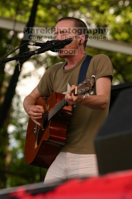 Damien Rice performs on the 99X stage on the second day of Music Midtown, 2004.

Filename: IMG_6377.jpg
Aperture: f/5.0
Shutter Speed: 1/320
Body: Canon EOS DIGITAL REBEL
Lens: Canon EF 80-200mm f/2.8 L