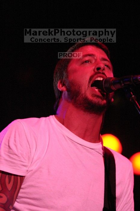 The Foo Fighters perform on the 99X stage on the second day of Music Midtown, 2004.

Filename: IMG_6825.jpg
Aperture: f/4.0
Shutter Speed: 1/250
Body: Canon EOS DIGITAL REBEL
Lens: Canon EF 80-200mm f/2.8 L