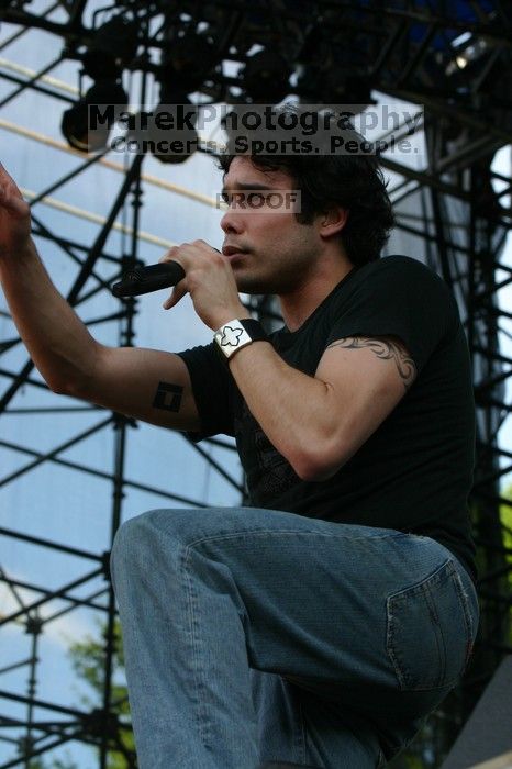 Trapt performs on the 99X stage on the second day of Music Midtown, 2004.

Filename: IMG_6549.jpg
Aperture: f/7.1
Shutter Speed: 1/320
Body: Canon EOS DIGITAL REBEL
Lens: Canon EF 80-200mm f/2.8 L