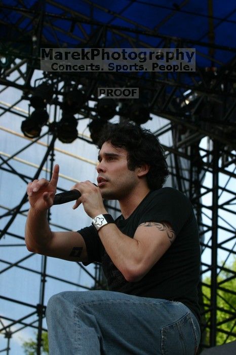 Trapt performs on the 99X stage on the second day of Music Midtown, 2004.

Filename: IMG_6550.jpg
Aperture: f/7.1
Shutter Speed: 1/320
Body: Canon EOS DIGITAL REBEL
Lens: Canon EF 80-200mm f/2.8 L