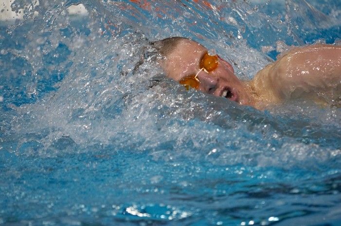 Scott Drews of the University of Texas Men's Varsity Swim Team placed 5th in the 1st heat of the 1650 Freestyle Finals with a time of 15:38.65 at the Speedo American Short Course Championships.

Filename: SRM_20060304_185248_6.jpg
Aperture: f/2.8
Shutter Speed: 1/1000
Body: Canon EOS 20D
Lens: Canon EF 80-200mm f/2.8 L