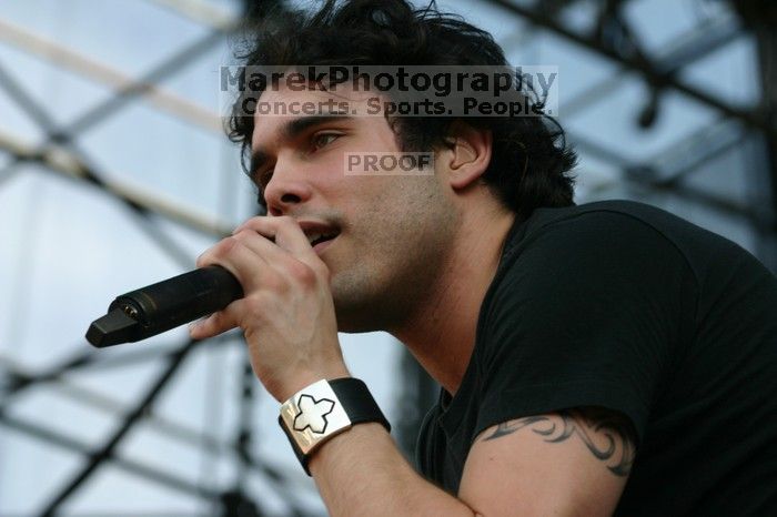 Trapt performs on the 99X stage on the second day of Music Midtown, 2004.

Filename: IMG_6555.jpg
Aperture: f/7.1
Shutter Speed: 1/320
Body: Canon EOS DIGITAL REBEL
Lens: Canon EF 80-200mm f/2.8 L