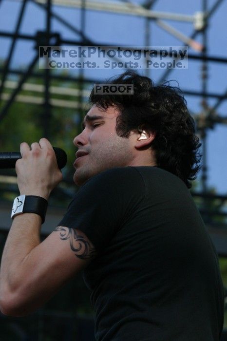 Trapt performs on the 99X stage on the second day of Music Midtown, 2004.

Filename: IMG_6560.jpg
Aperture: f/9.0
Shutter Speed: 1/320
Body: Canon EOS DIGITAL REBEL
Lens: Canon EF 80-200mm f/2.8 L