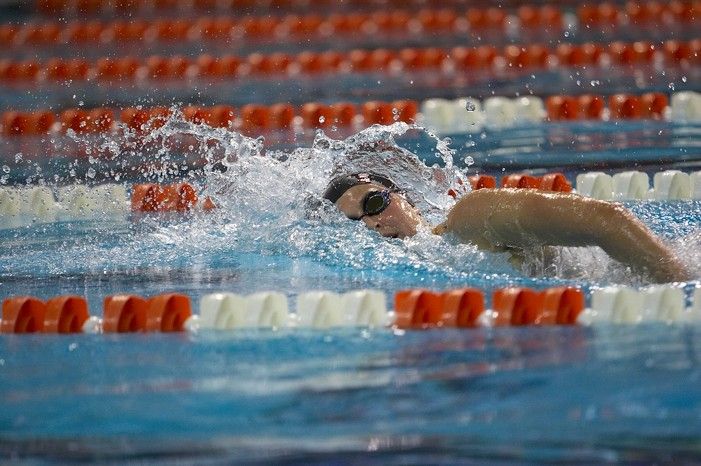 Kelsey Ditto of the Longhorn Aquatic swim team placed 1st in the last heat of the 1650 Freestyle Finals with a time of 16:05.39 at the Speedo American Short Course Championships.

Filename: SRM_20060304_183332_6.jpg
Aperture: f/2.8
Shutter Speed: 1/1000
Body: Canon EOS 20D
Lens: Canon EF 80-200mm f/2.8 L