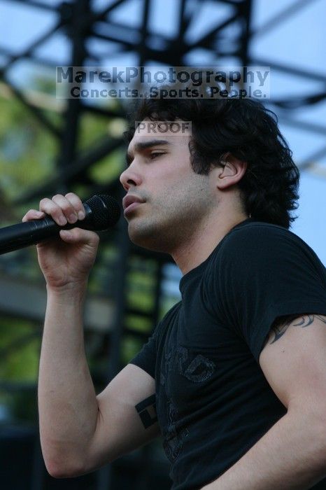 Trapt performs on the 99X stage on the second day of Music Midtown, 2004.

Filename: IMG_6534.jpg
Aperture: f/6.3
Shutter Speed: 1/320
Body: Canon EOS DIGITAL REBEL
Lens: Canon EF 80-200mm f/2.8 L