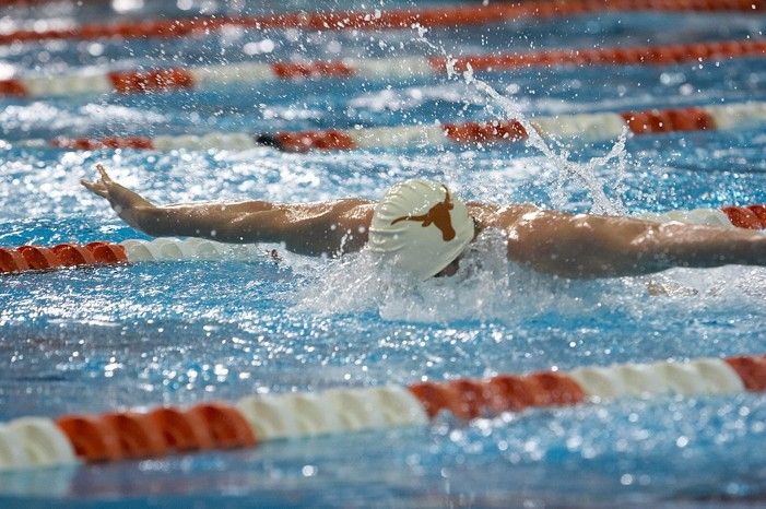 Matthew Lowe of the University of Texas Men's Varsity Swim Team placed 6th in the last heat of the 200 IM Finals with a time of 1:50.02 at the Speedo American Short Course Championships.

Filename: SRM_20060304_192212_8.jpg
Aperture: f/3.5
Shutter Speed: 1/800
Body: Canon EOS 20D
Lens: Canon EF 80-200mm f/2.8 L