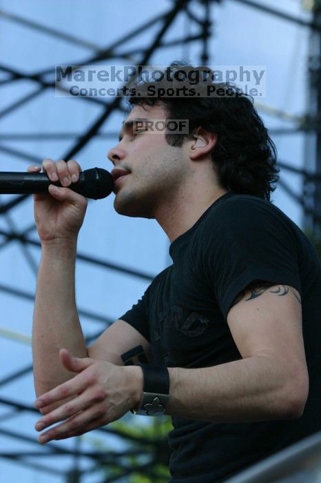 Trapt performs on the 99X stage on the second day of Music Midtown, 2004.

Filename: IMG_6535.jpg
Aperture: f/7.1
Shutter Speed: 1/320
Body: Canon EOS DIGITAL REBEL
Lens: Canon EF 80-200mm f/2.8 L