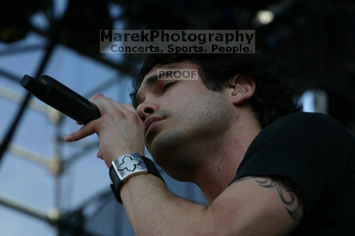 Trapt performs on the 99X stage on the second day of Music Midtown, 2004.

Filename: IMG_6554.jpg
Aperture: f/9.0
Shutter Speed: 1/320
Body: Canon EOS DIGITAL REBEL
Lens: Canon EF 80-200mm f/2.8 L