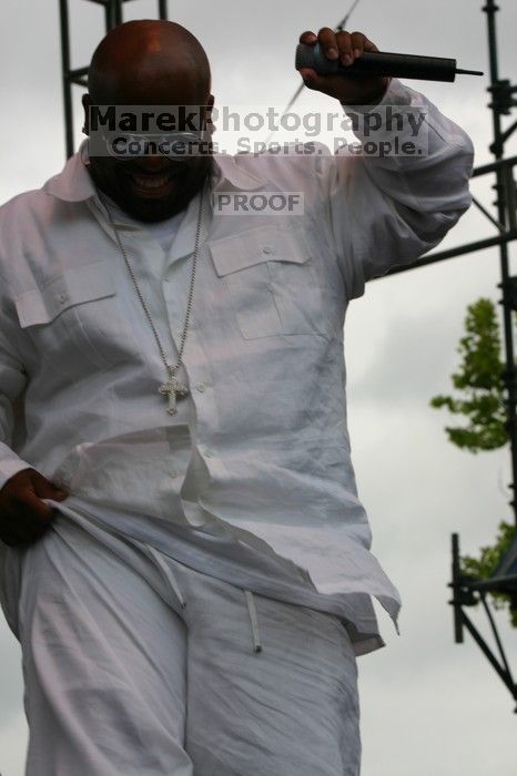 Cee Lo performs on the third day of Music Midtown, 2004.

Filename: IMG_6904.jpg
Aperture: f/11.0
Shutter Speed: 1/250
Body: Canon EOS DIGITAL REBEL
Lens: Canon EF 80-200mm f/2.8 L