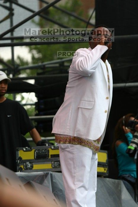 Cee Lo performs on the third day of Music Midtown, 2004.

Filename: IMG_6929.jpg
Aperture: f/5.0
Shutter Speed: 1/320
Body: Canon EOS DIGITAL REBEL
Lens: Canon EF 80-200mm f/2.8 L