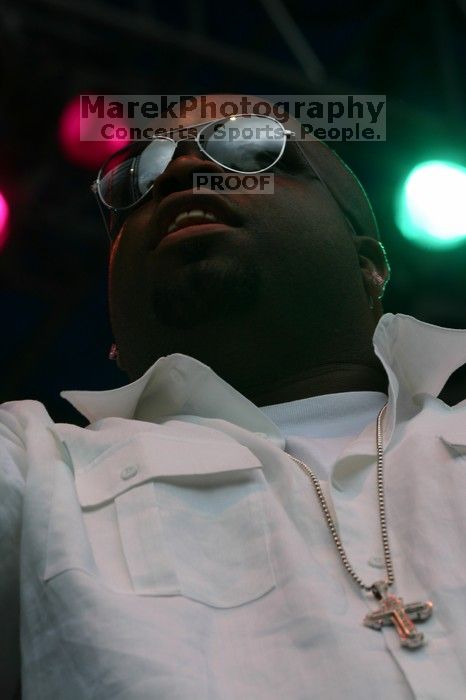 Cee Lo performs on the third day of Music Midtown, 2004.

Filename: IMG_6952.jpg
Aperture: f/8.0
Shutter Speed: 1/320
Body: Canon EOS DIGITAL REBEL
Lens: Canon EF 80-200mm f/2.8 L