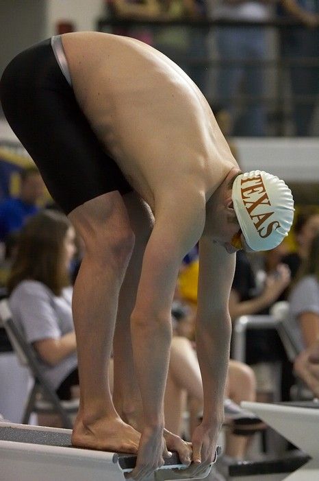 Matthew Lowe of the University of Texas Men's Varsity Swim Team placed 6th in the last heat of the 200 IM Finals with a time of 1:50.02 at the Speedo American Short Course Championships.

Filename: SRM_20060304_192200_4.jpg
Aperture: f/3.5
Shutter Speed: 1/800
Body: Canon EOS 20D
Lens: Canon EF 80-200mm f/2.8 L