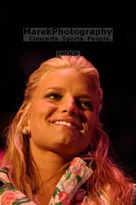 Jessica Simpson performs on the third day of Music Midtown, 2004.

Filename: IMG_7364.jpg
Aperture: f/2.8
Shutter Speed: 1/250
Body: Canon EOS DIGITAL REBEL
Lens: Canon EF 80-200mm f/2.8 L